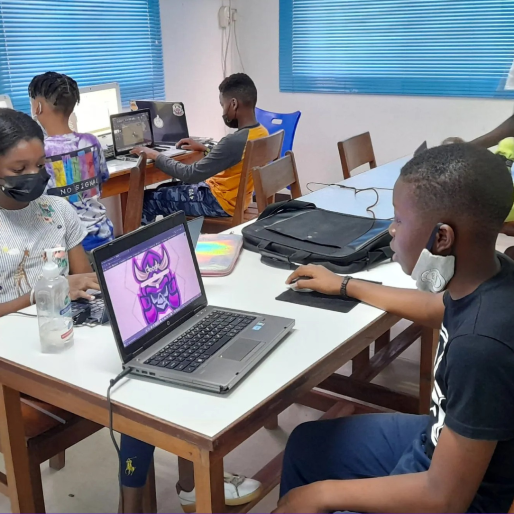 A group of young Nigerian coders presenting their coding projects