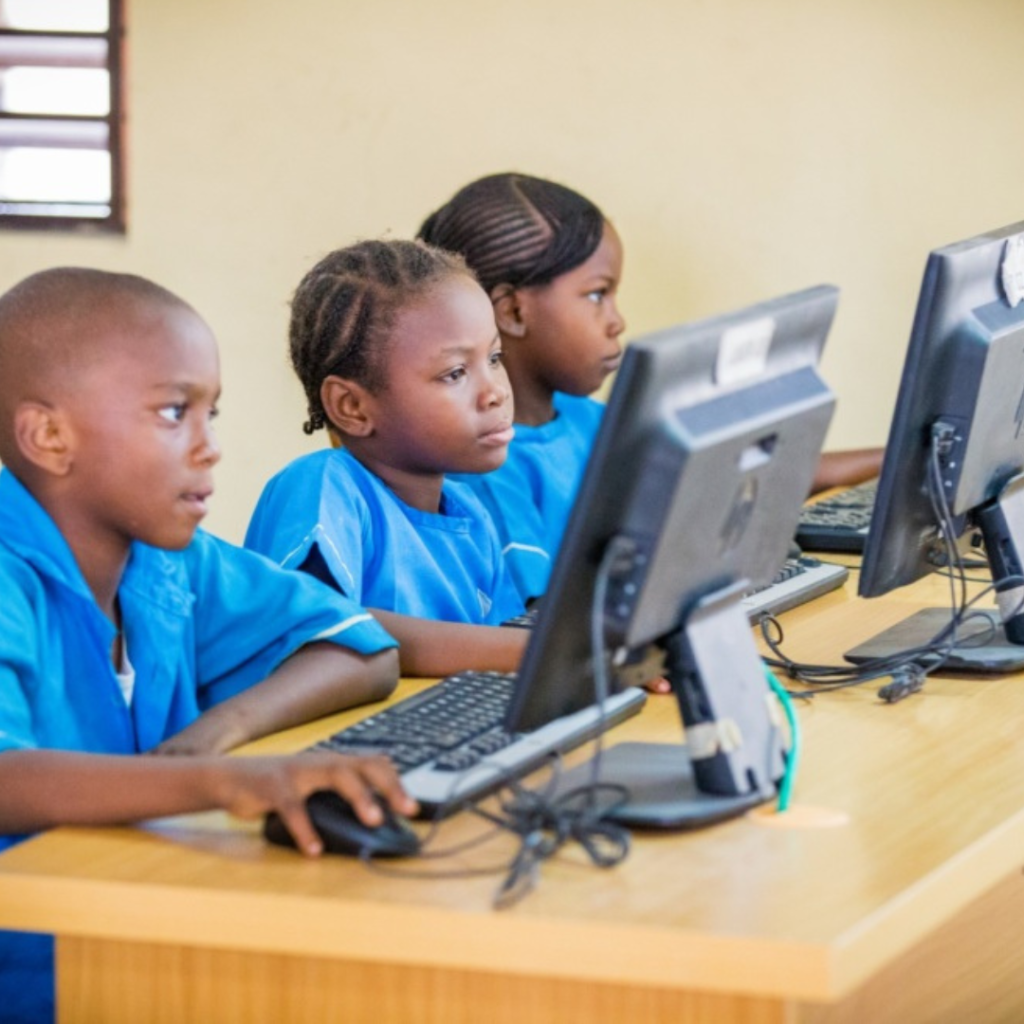 A Nigerian classroom with students using tablets